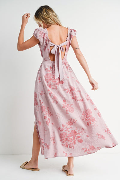 Back picture of pink floral dress. Bow to tie it in the back